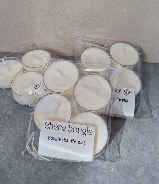 Lot de 4 bougies chauffe-plat naturelles Chère Bougie en cire de soja, présentées sur une surface en pierre